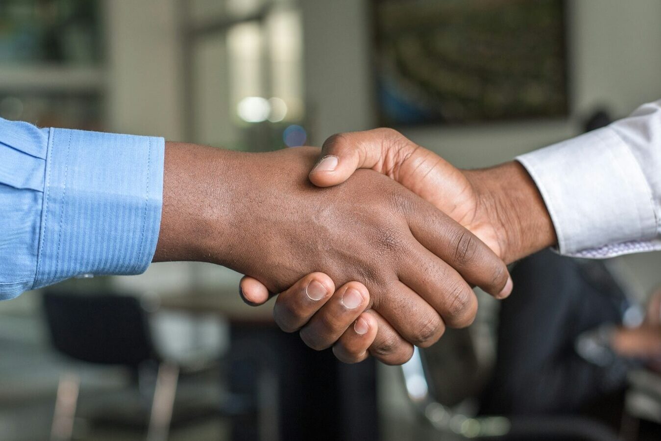 two people shaking hands